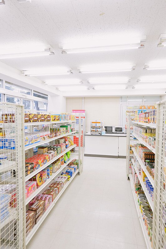 Modern convenience store interior with LED lighting