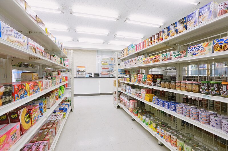 Convenience store shelves with proper retail lighting