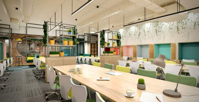 Open co-working area with desks and balanced overhead lighting