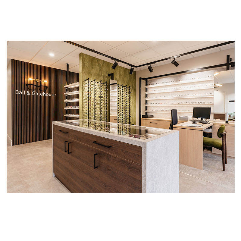 Eyewear display shelving with precision accent lighting highlighting individual frame collections