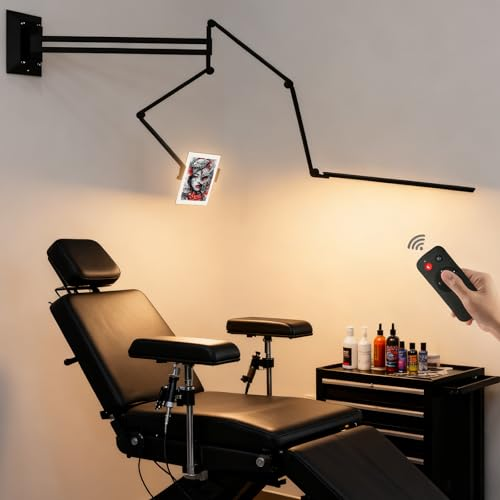 Tattoo studio workstation with professional lighting setup